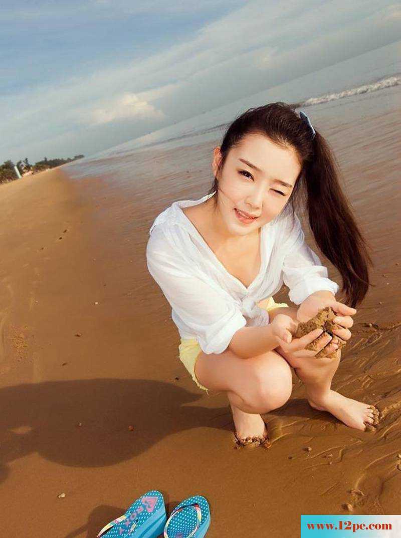 赵已晨海滩清凉写真美腿展现极致(10P)